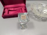 a small glass bowl and a small glass bowl on a table