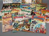a lot of comic books that are on the table