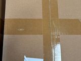 boxes are stacked on top of each other in a warehouse