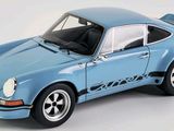 blue model of a car with a white background and a blue background