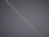 an image of a silver chain on a gray background