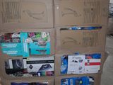 many boxes stacked on top of each other on the floor