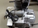 a small engine that is sitting on the floor