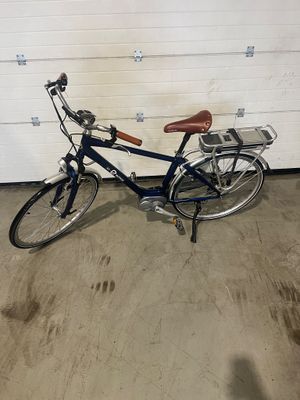 a bicycle that is parked in a garage