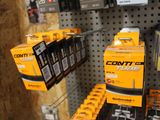 many different types of batteries on display in a store