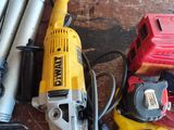 many tools that are sitting on a brick floor
