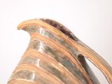 a vase that is sitting on top of a table