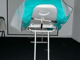 a white and blue object on a stand in a room