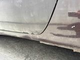 a close up of a car ' s door handle and door handle