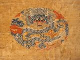 a picture of a dragon on a piece of cloth