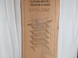 a cardboard box with a picture of a clothes dryer inside of it