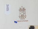 a picture of a plate with a picture of a castle on it