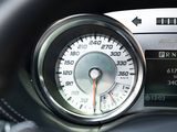 a close up of a car dashboard with a speedometer
