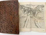 an old book with a drawing of a map on it