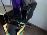a chair that has a snowboard on top of it