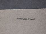 a close up of a piece of paper with the words atelier jean hutet