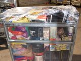 a metal cart with many items on it in a warehouse