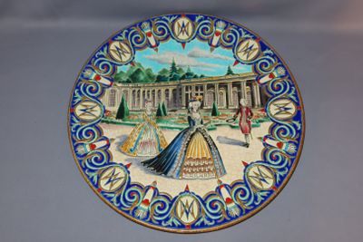 a decorative plate with a picture of a woman on it