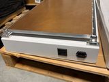 an image of a metal object on a pallet in a warehouse