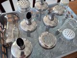 a tray with salt and pepper shakers on it