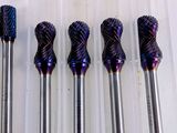 four different types of drill bits in a plastic case