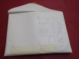 a piece of paper with writing on it sitting on a table