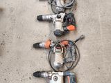 many different types of power tools lined up on the floor