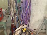 a pile of tools sitting on the floor in a room