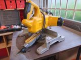 a yellow machine that is sitting on a table