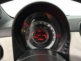 a close up of a car dashboard with a speedometer