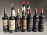 several bottles of wine are lined up in a row on a table