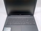 the dell laptop is open and ready to be used