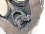 an old gas mask with a gas mask on top of it