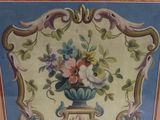 a picture of a picture of a vase with flowers on it