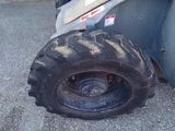 a tractor tire that has been left on the ground