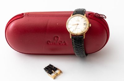 a red case with a watch on it next to a pair of scissors