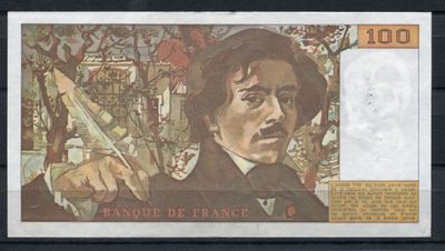 un vieux billet de banque sur lequel figure l'image d'un homme tenant un pistolet