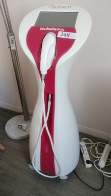 an image of a white and red hair dryer in a room