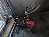 a stationary exercise bike in the corner of the room