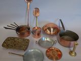 many different types of pots and pans on the table