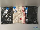 trois paires de boxers pour homme, en noir, blanc et rouge