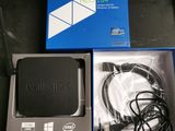 an image of a box with a remote and a charger in it