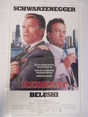 affiche du film « Redheat », représentant deux hommes armés