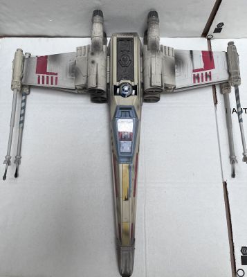 a model of a star wars tier that is on display