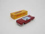 toy car with box of disney toys on a white surface