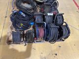 a lot of wires that are sitting on the floor