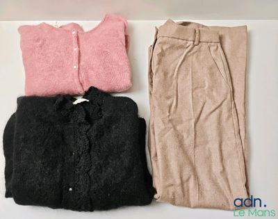 three pieces of clothing sitting on top of a table next to each other