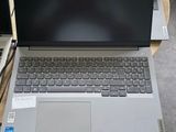 three laptops that are sitting on a table