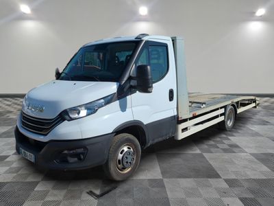 a white truck with a flat bed in a room