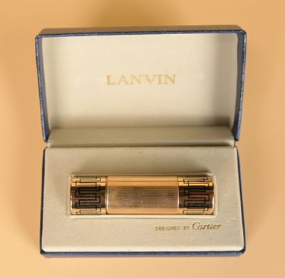 a pen in a box that is open on a table